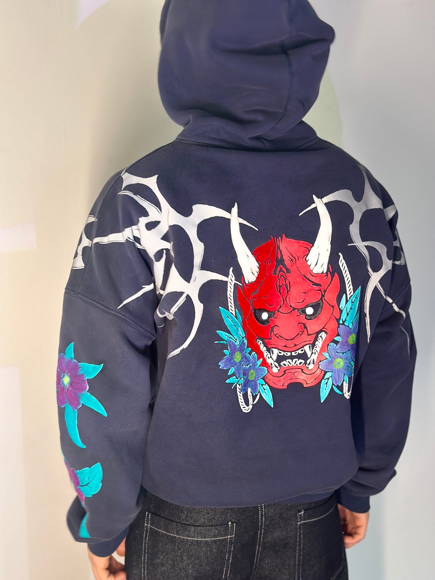 ONI BLOOM Hoodie. Worn as armor. Sealed with bloom