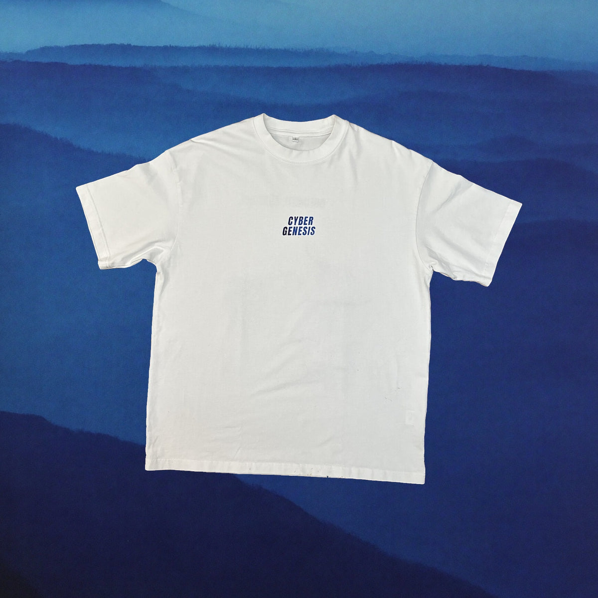 White oversized tee front with blue Cyber Genesis chest logo