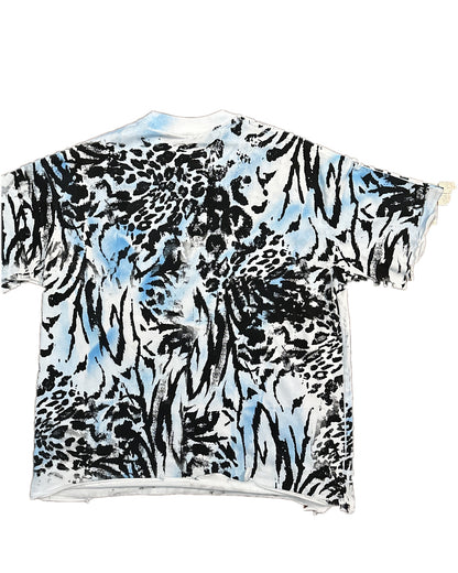 FERAL tee back angled view