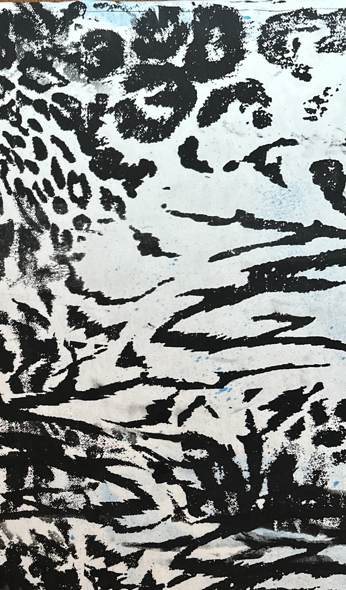 FERAL tee print close-up